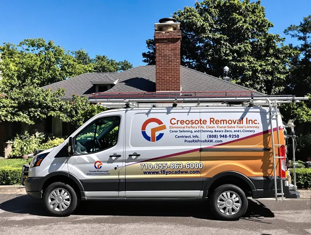 Whitehall Chimney Sweep technician removing creosote safely in Whitehall, OH
