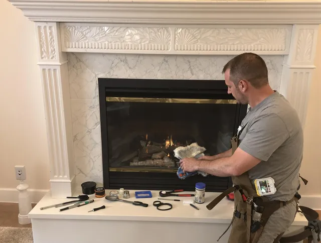Whitehall Chimney Sweep performing fireplace maintenance in Whitehall, OH